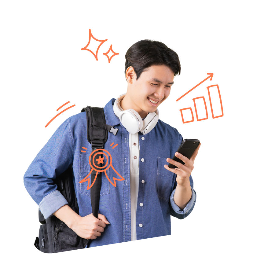 High school student looking at his phone and smiling High school student looking at his phone and smiling
